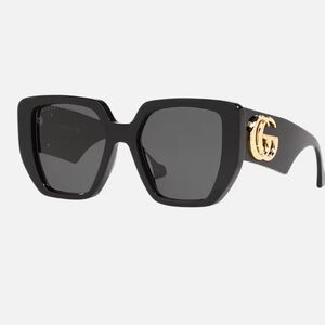 Gucci Black Women's Sunglasses with Gold Detail